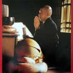 BUDDHIST monk in prayer